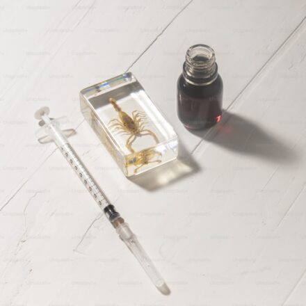 BPC-157 peptide research vial and syringe in laboratory setting