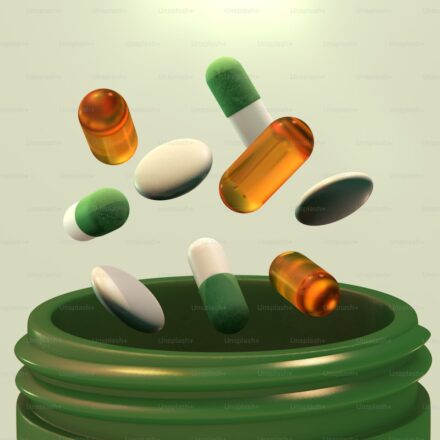 Supplement bottles and vitamins representing longevity expert consensus recommendations