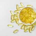 Fish oil omega-3 softgel capsules in a white bowl - CoreStacks 2026 fish oil buying guide